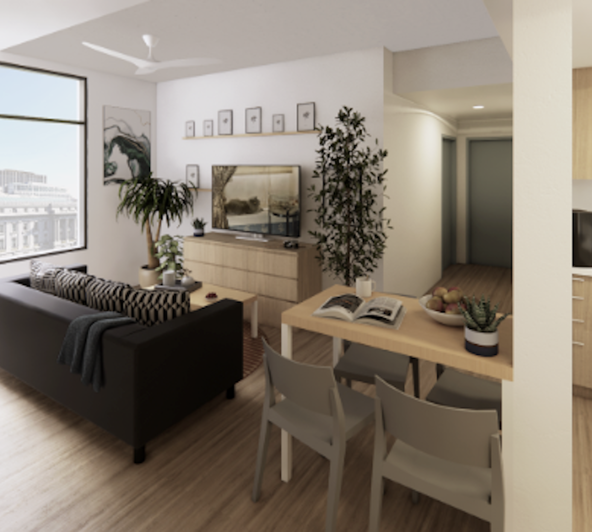 An apartment in The Kelsey Civic Center. A couch, a dining table, a TV, a dresser, and doors in a hallway are visible on one side of the wall. An oven with cabinets above it is visible on the other side. San Francisco City Hall is visible out of the window of the unit.